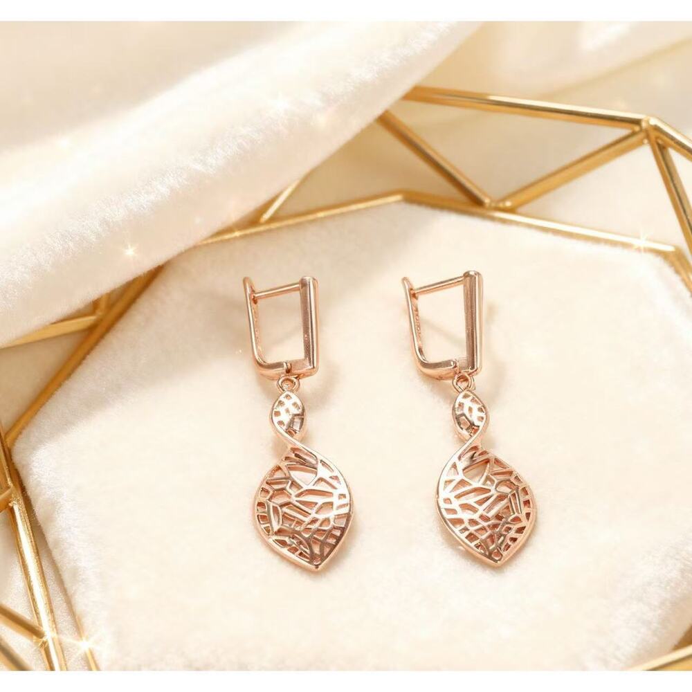 Delicate and petite openwork cross earrings